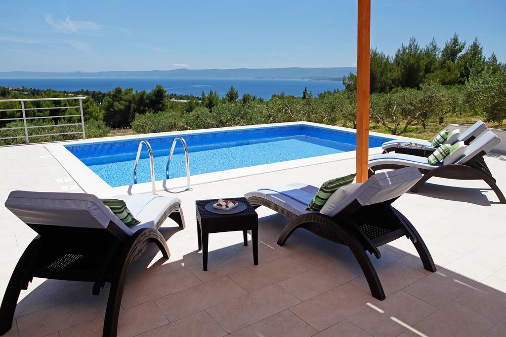 Holiday Homes Oliva Bol Habitación foto