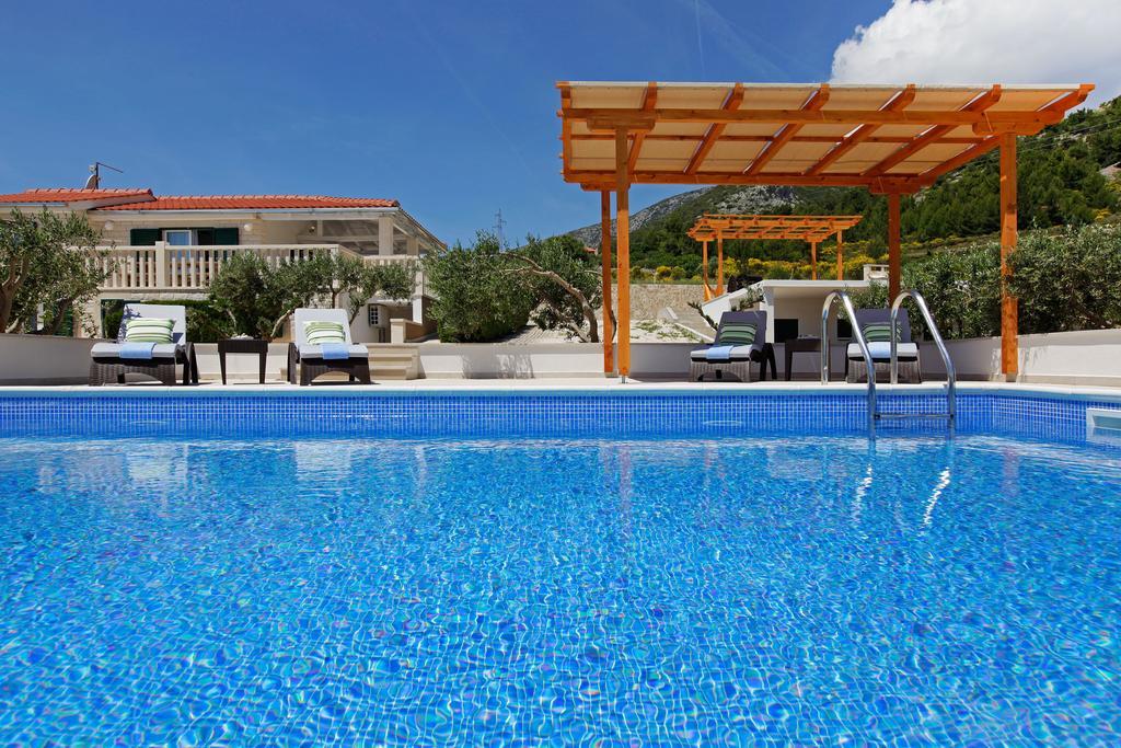 Holiday Homes Oliva Bol Habitación foto