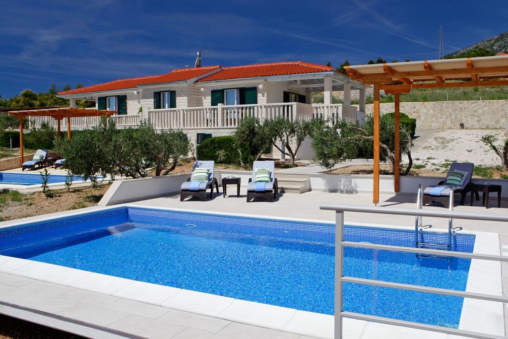 Holiday Homes Oliva Bol Habitación foto